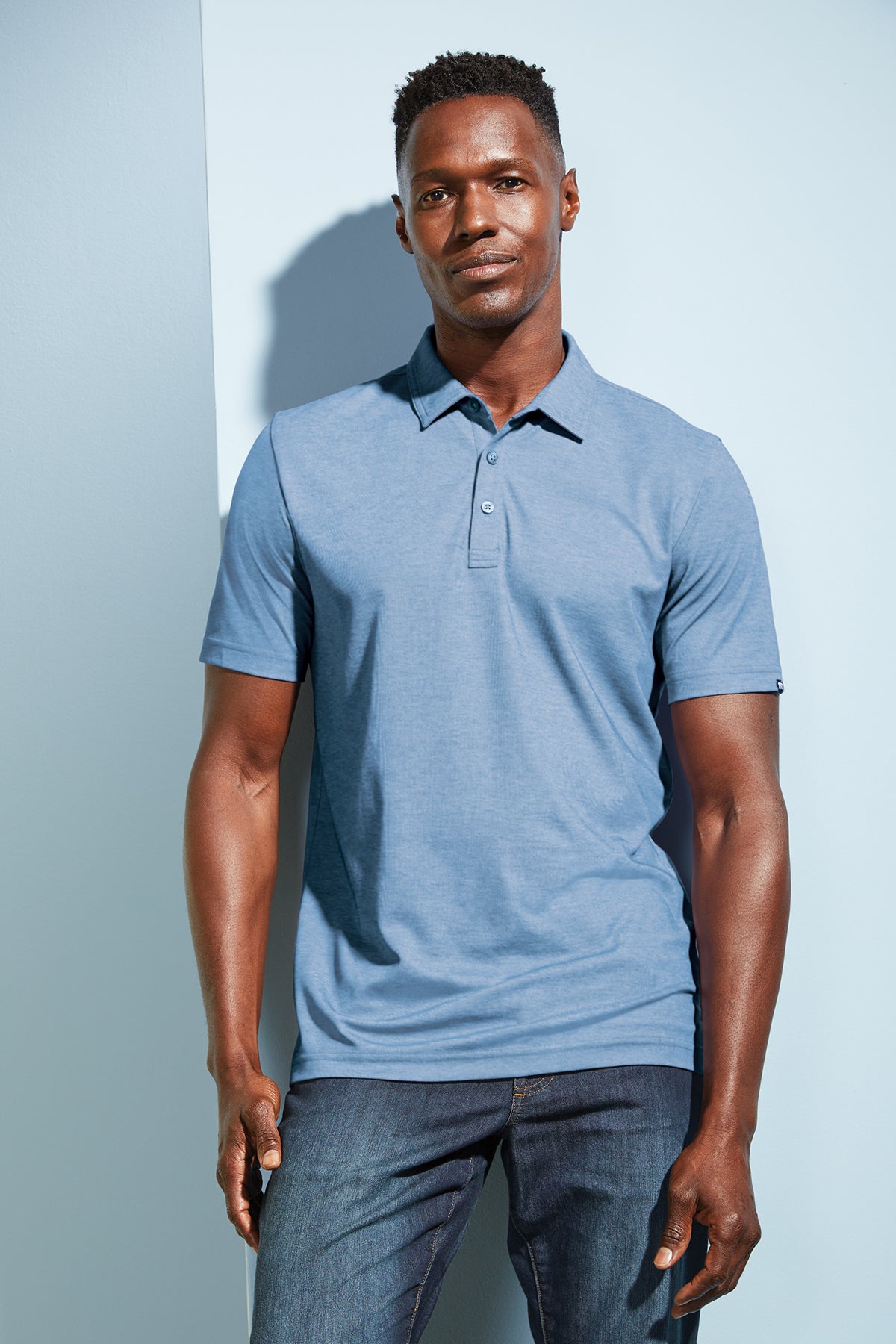 TravisMathew Oceanside Heather Polo in Quiet Shade Grey Heather, view on model