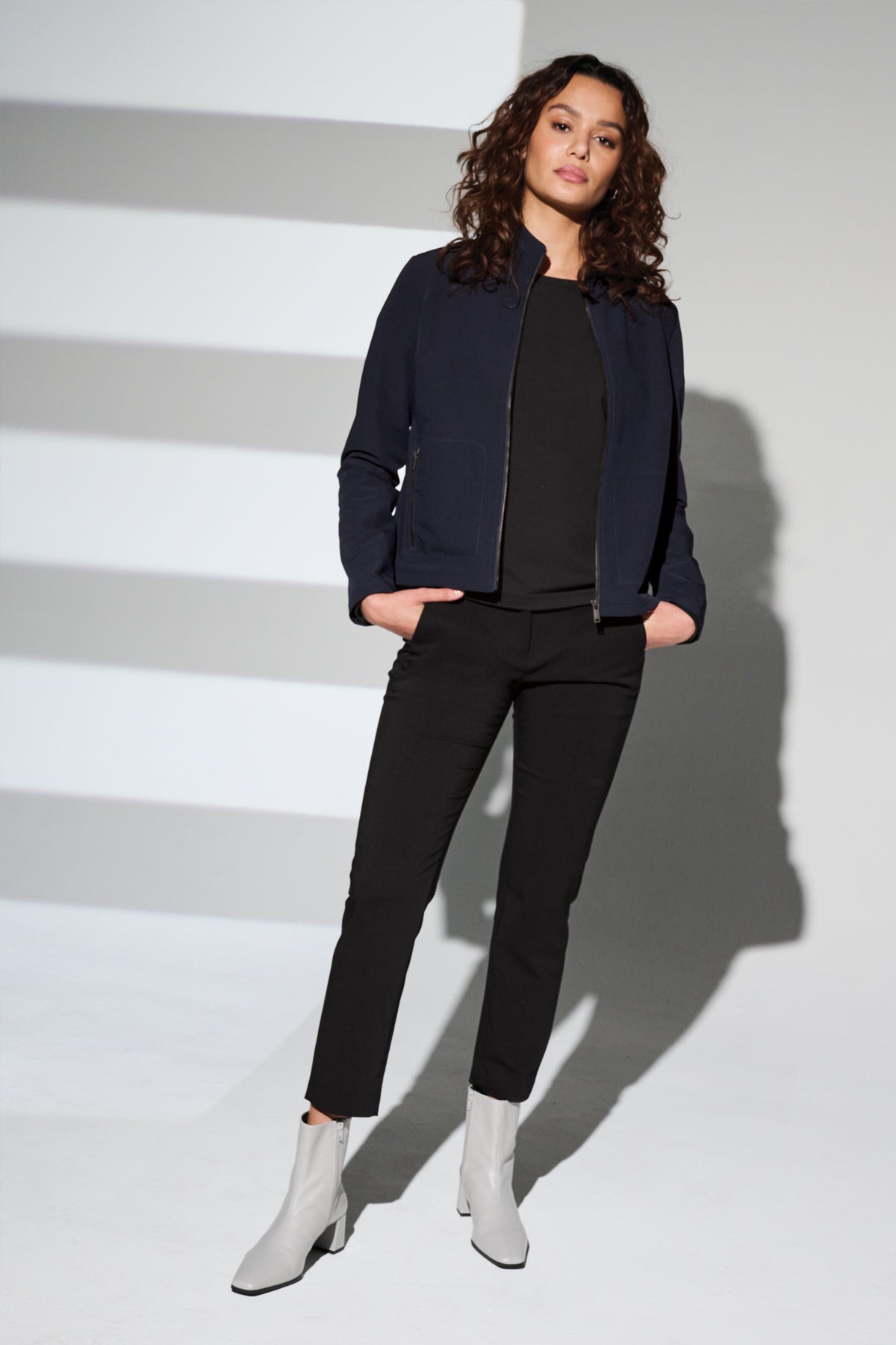 Mercer+Mettle Women’s Stretch Soft Shell Jacket in Night Navy, view on model