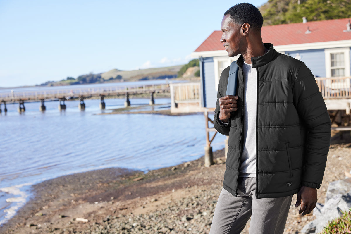 TravisMathew Cold Bay Jacket in Black, view on model