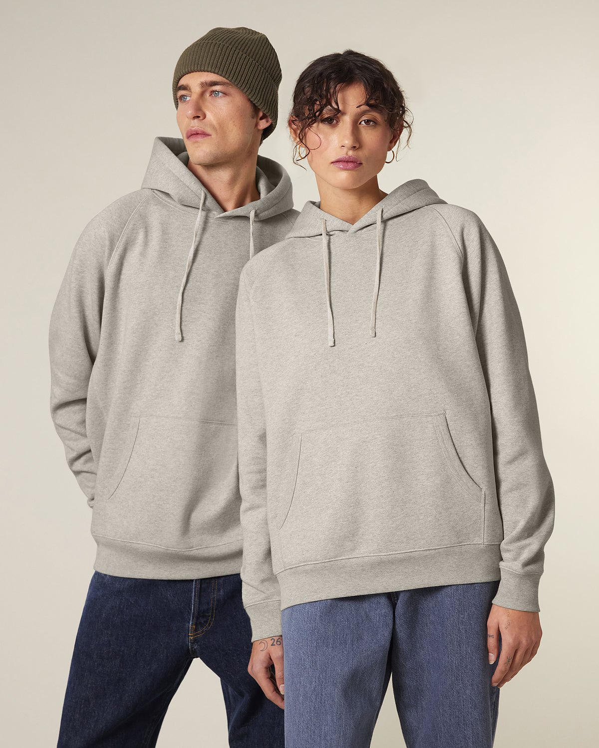 Stanley/Stella Unisex Striker Hooded Sweatshirt in Natural Raw, view on model