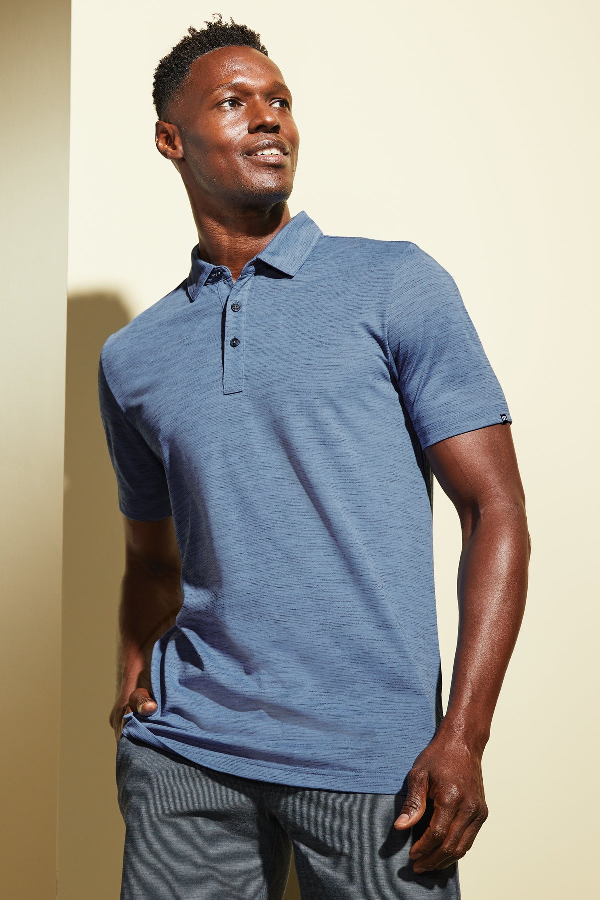 TravisMathew Auckland Slub Polo in Riviera Blue, view on model