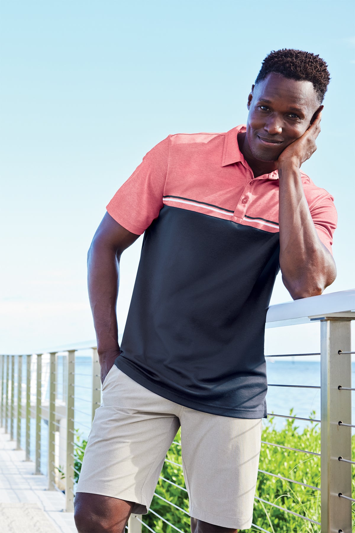 TravisMathew Sunset Blocked Polo in Riviera Heather/ Blue Nights, view on model