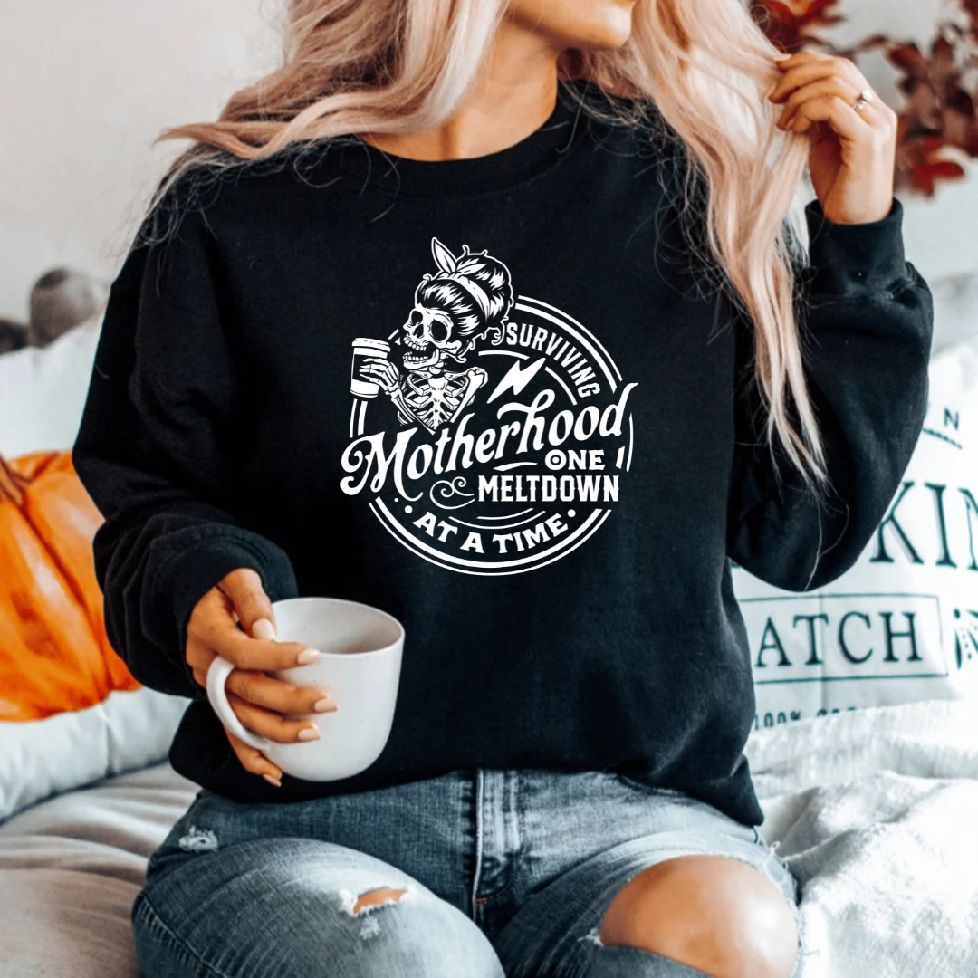 Surviving Motherhood One Meltdown at a Time Shirt