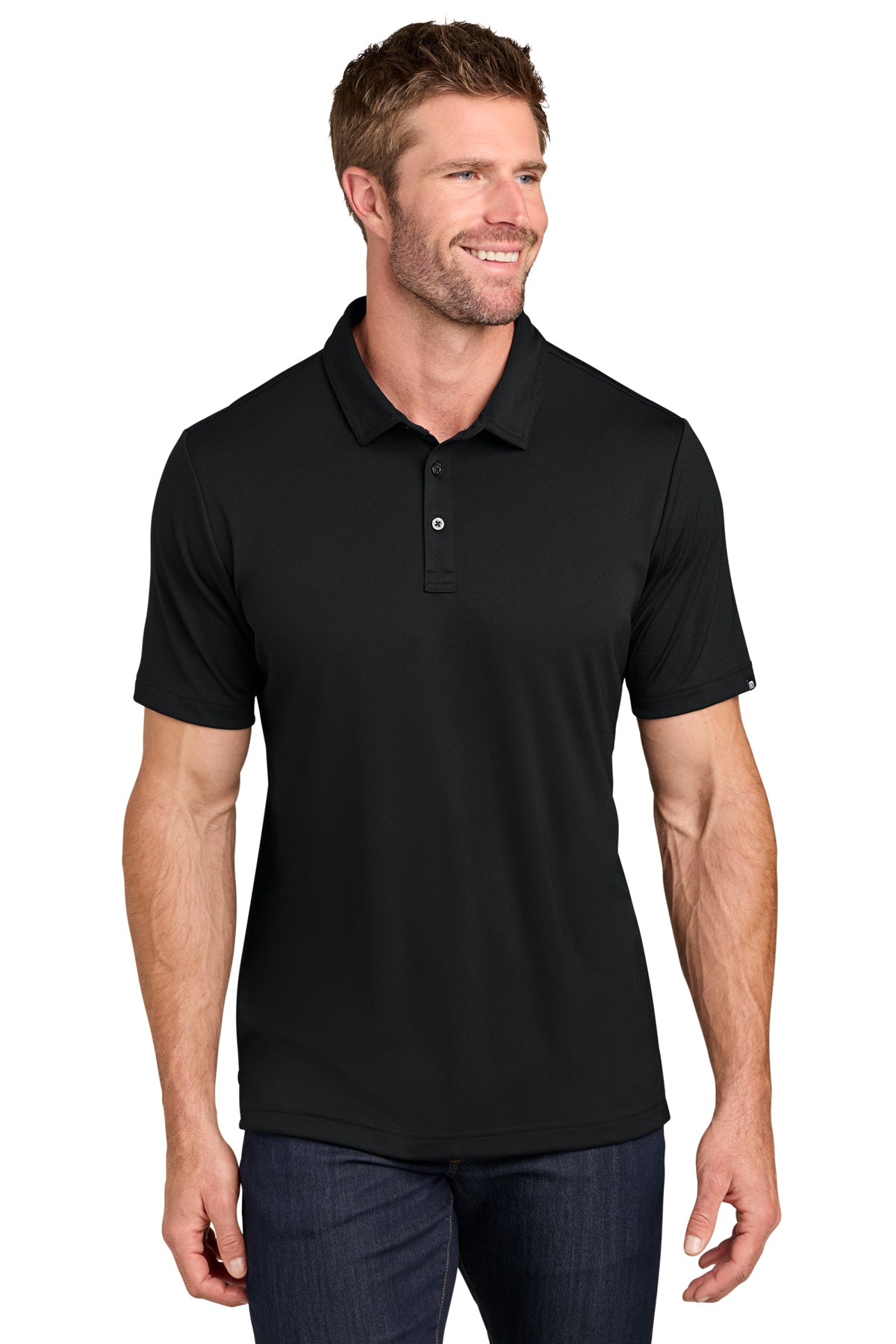 TravisMathew Coto Performance Polo in Black, front on model