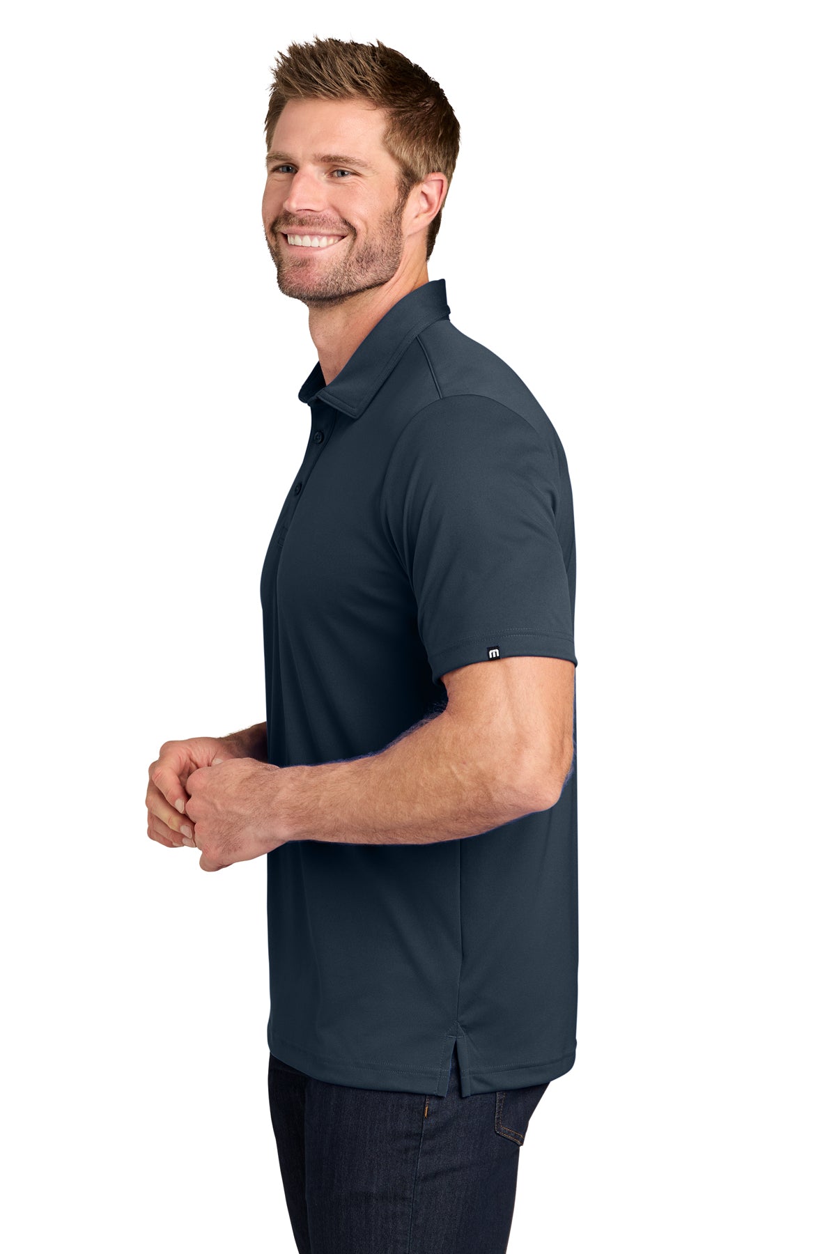 TravisMathew Coto Performance Polo in Blue Nights, side on model