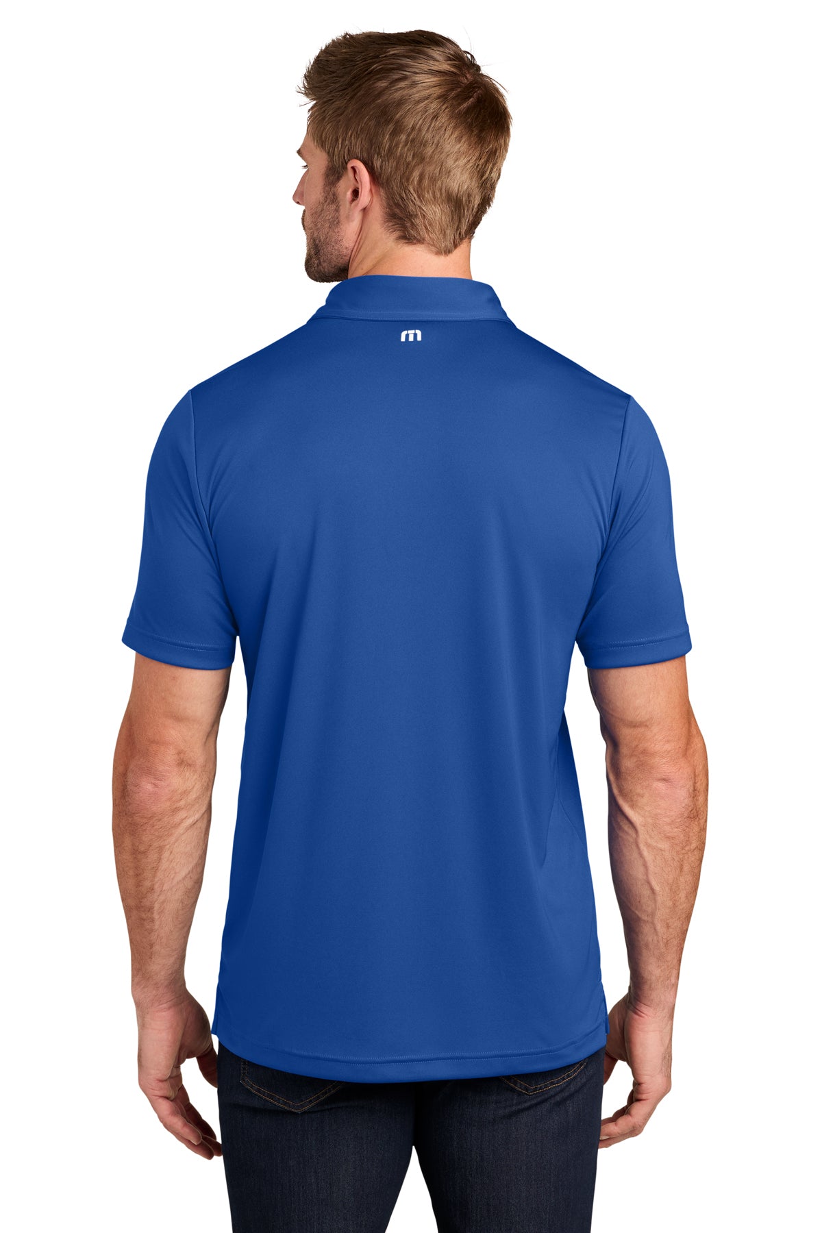 TravisMathew Coto Performance Polo in Royal Blue, back on model