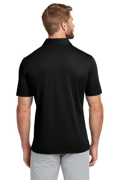 TravisMathew Oceanside Solid Polo in Black, back on model