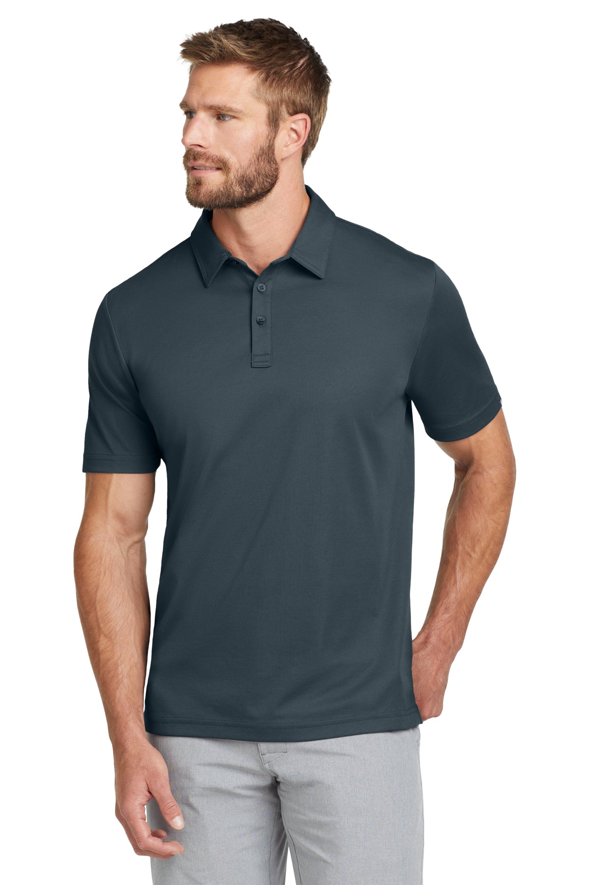 TravisMathew Oceanside Solid Polo in Blue Nights, front on model