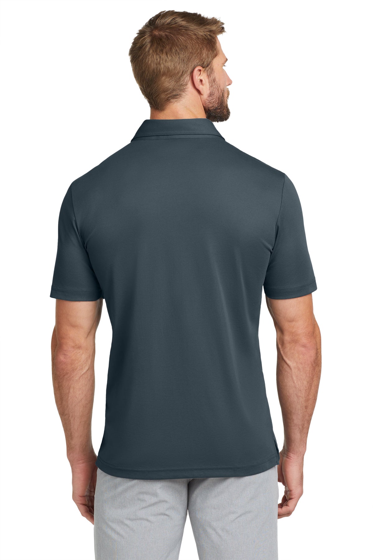 TravisMathew Oceanside Solid Polo in Blue Nights, back on model