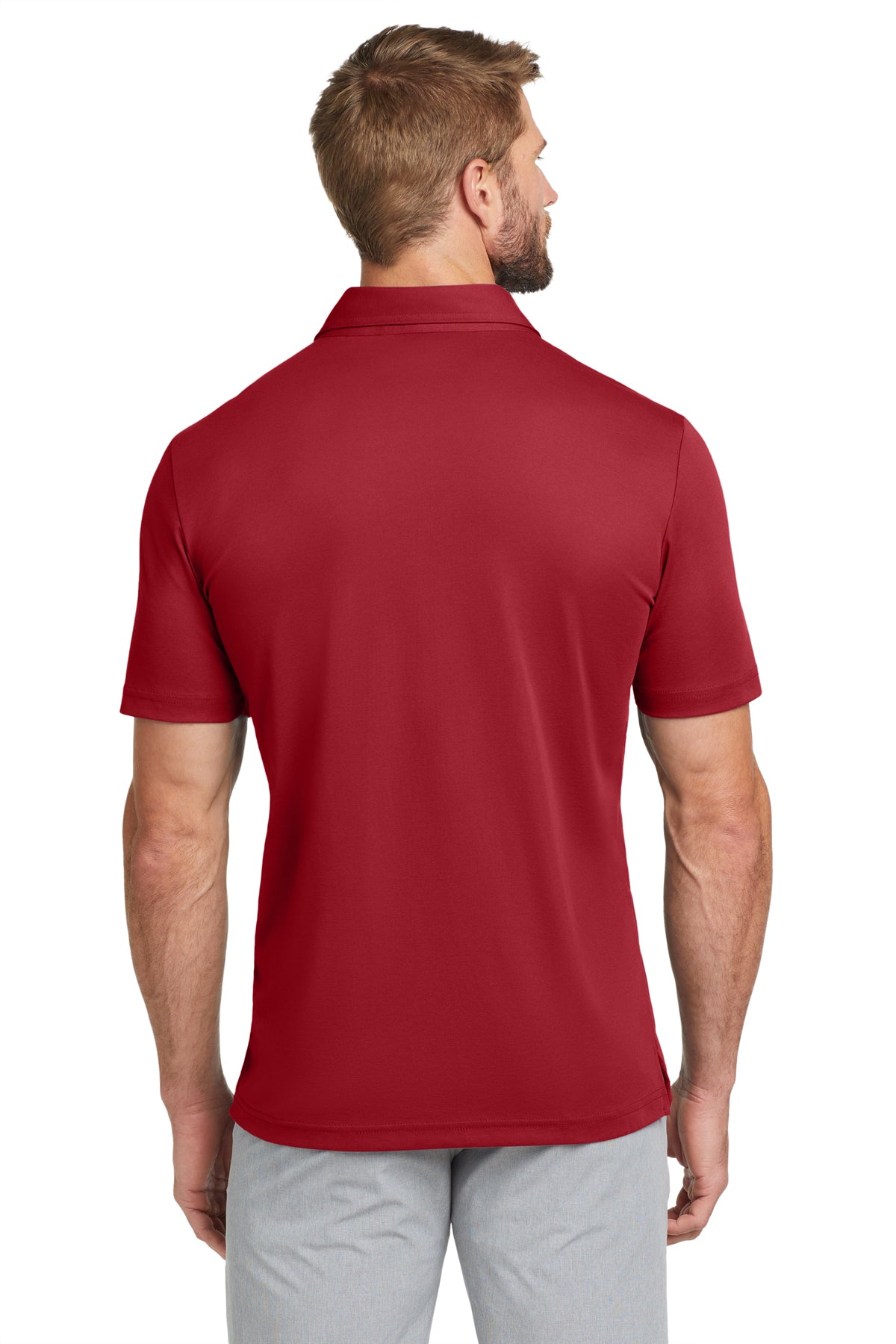 TravisMathew Oceanside Solid Polo in Scooter Red, back on model