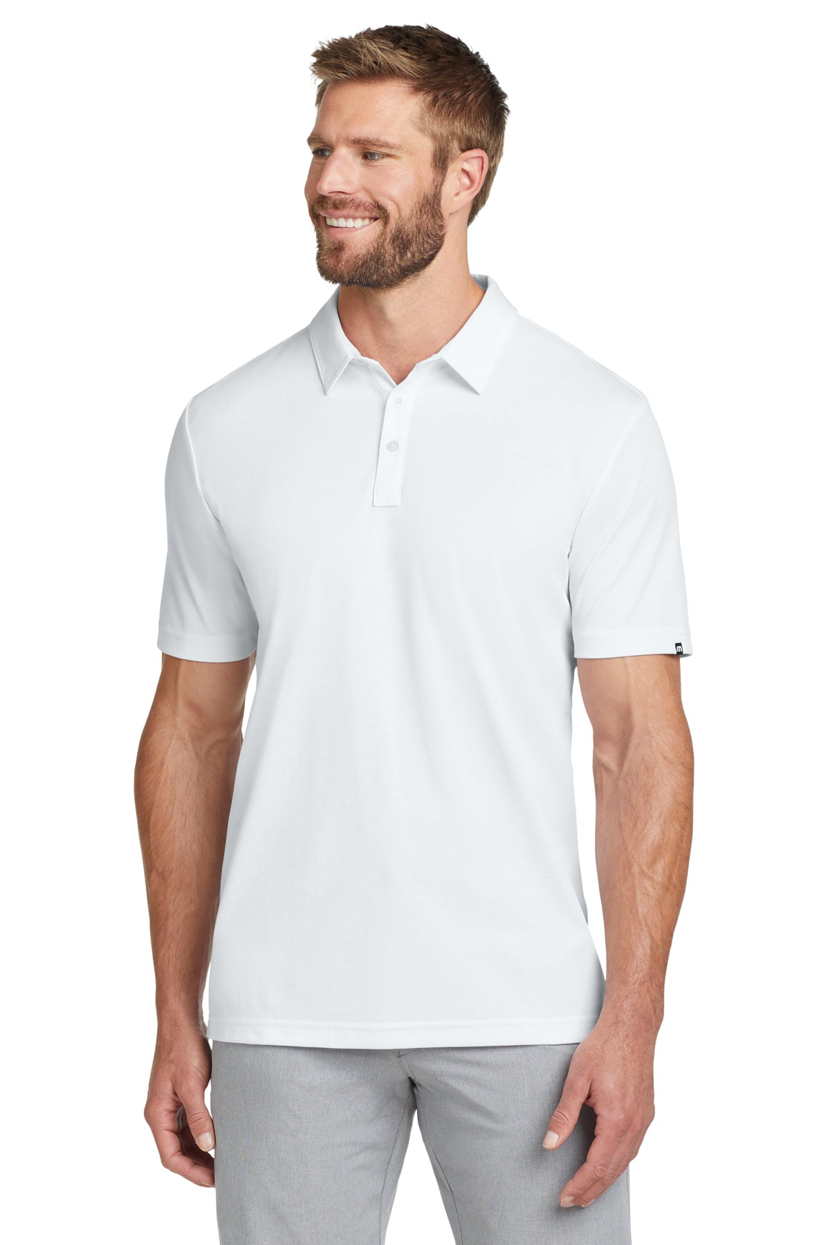 TravisMathew Oceanside Solid Polo in White, front on model