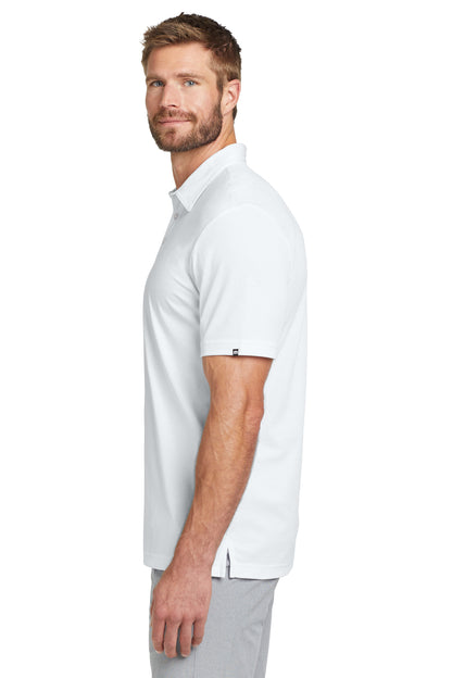 TravisMathew Oceanside Solid Polo in White, side on model
