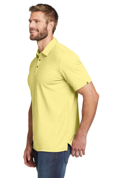TravisMathew Oceanside Heather Polo in Pale Banana Heather, side on model