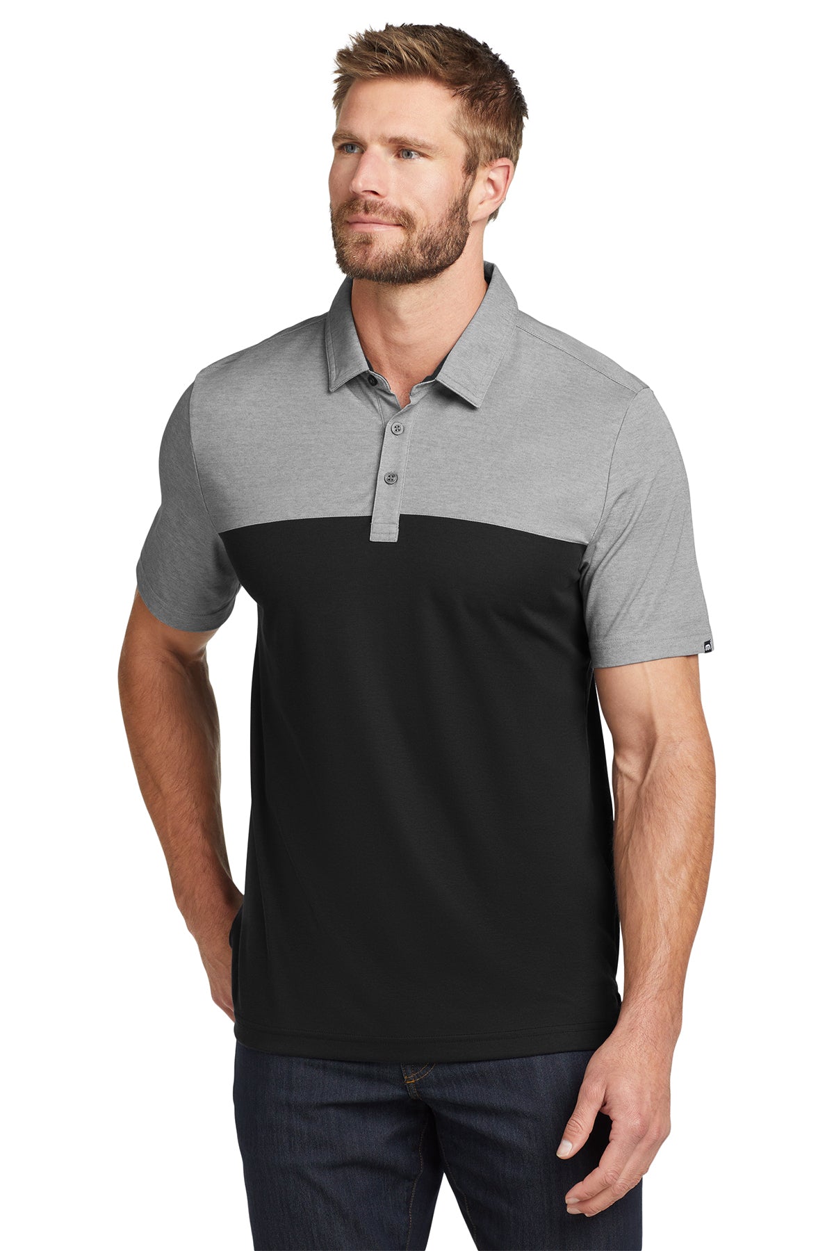 TravisMathew Oceanside Blocked Polo in Black Heather/ Black, front on model