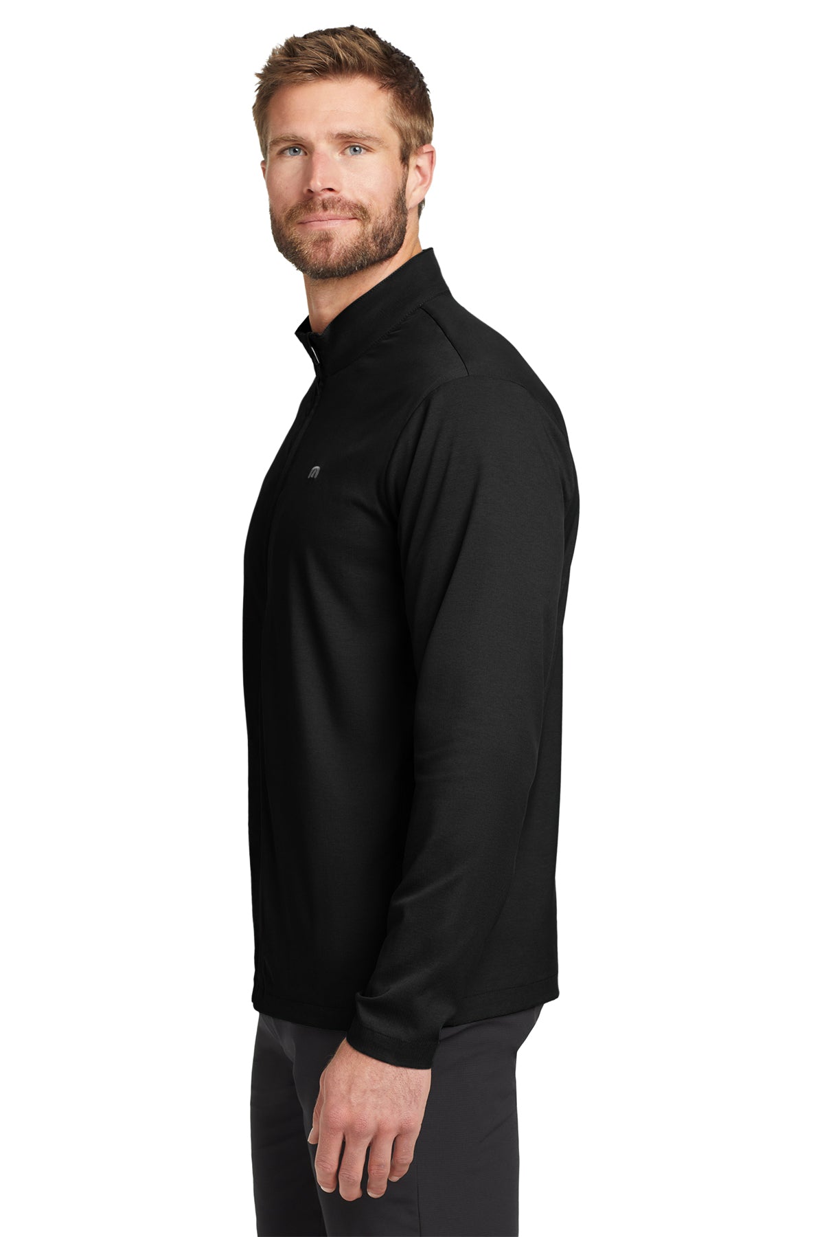 TravisMathew Surfside Full-Zip Jacket in Black, side on model