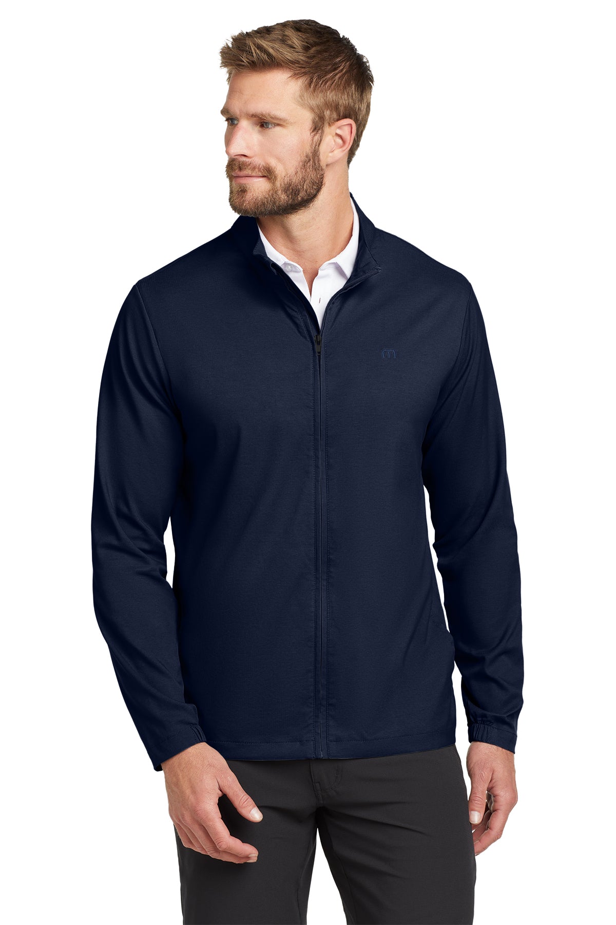 TravisMathew Surfside Full-Zip Jacket in Vintage Indigo/ Black, front on model