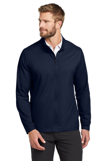 TravisMathew Surfside Full-Zip Jacket in Vintage Indigo/ Black, front on model