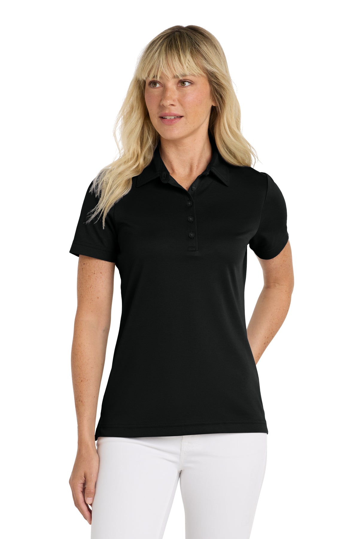 TravisMathew Women's Oceanside Solid Polo in Black, front on model