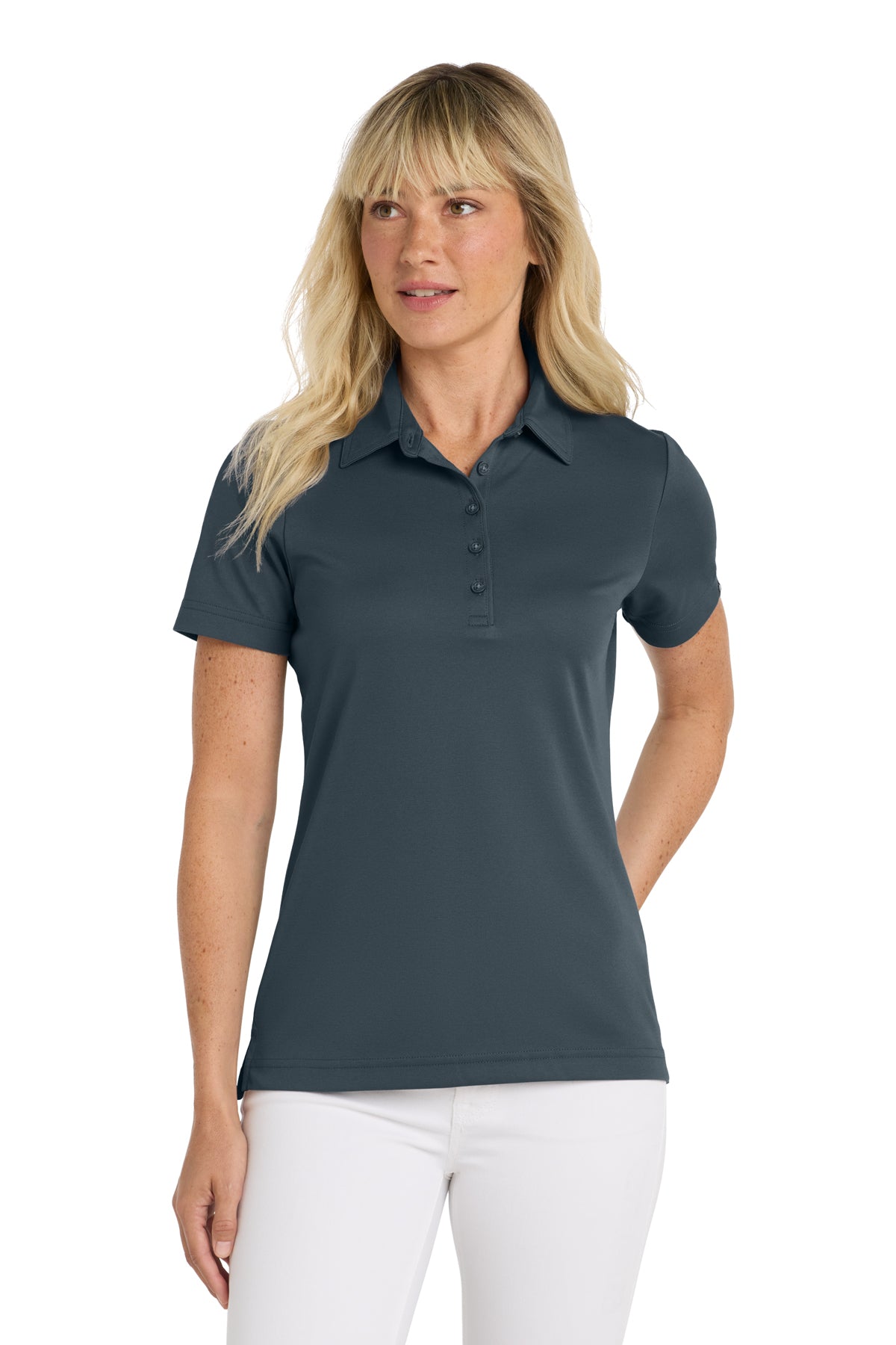 TravisMathew Women's Oceanside Solid Polo in Blue Nights, front on model