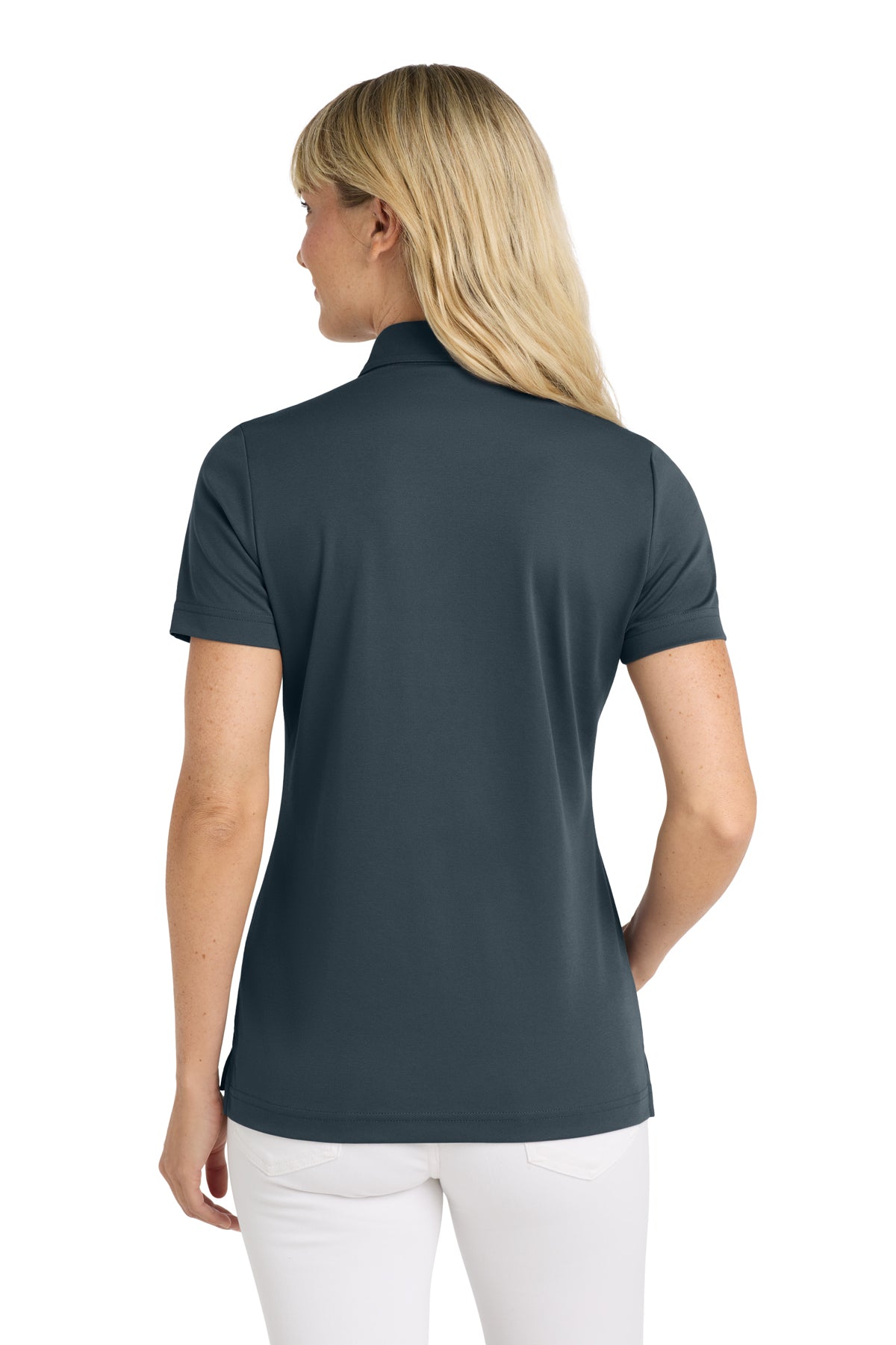 TravisMathew Women's Oceanside Solid Polo in Blue Nights, back on model