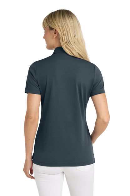 TravisMathew Women's Oceanside Solid Polo in Blue Nights, back on model