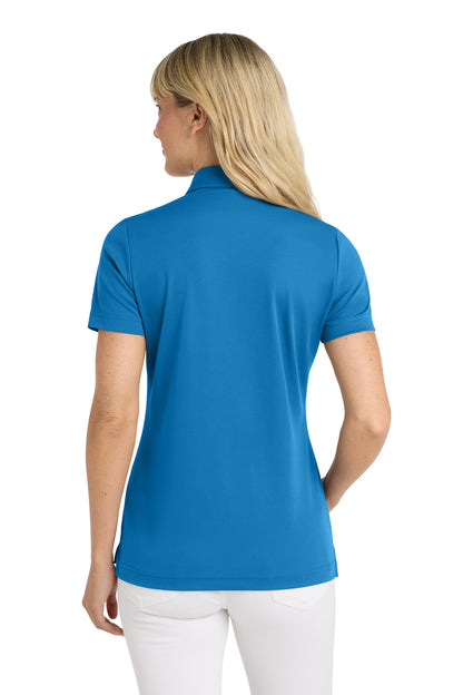 TravisMathew Women's Oceanside Solid Polo in Classic Blue, back on model