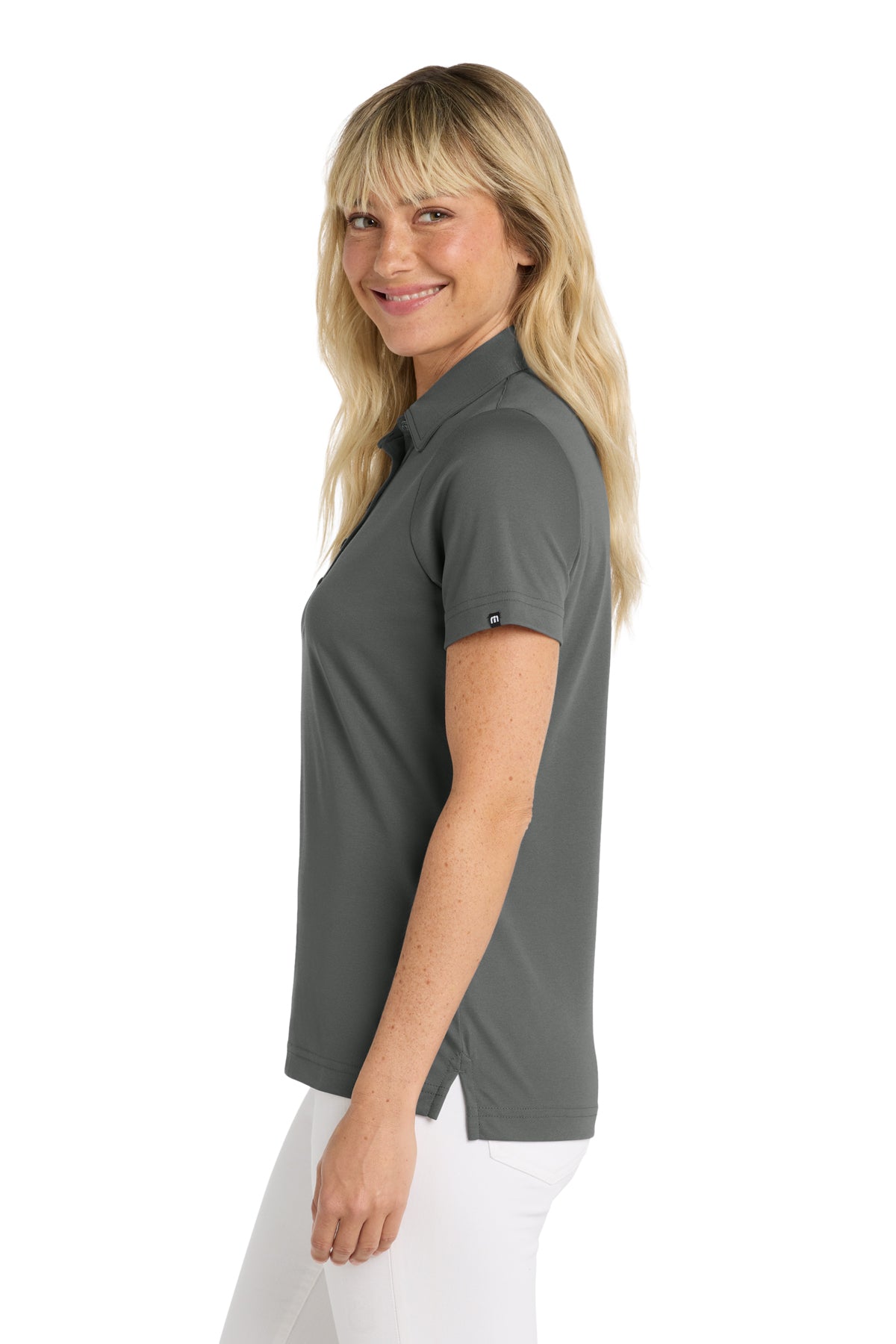 TravisMathew Women's Oceanside Solid Polo in Quiet Shade Grey, side on model