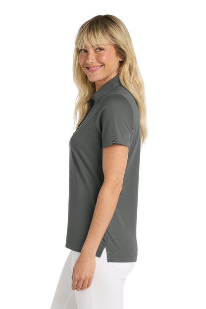 TravisMathew Women's Oceanside Solid Polo in Quiet Shade Grey, side on model