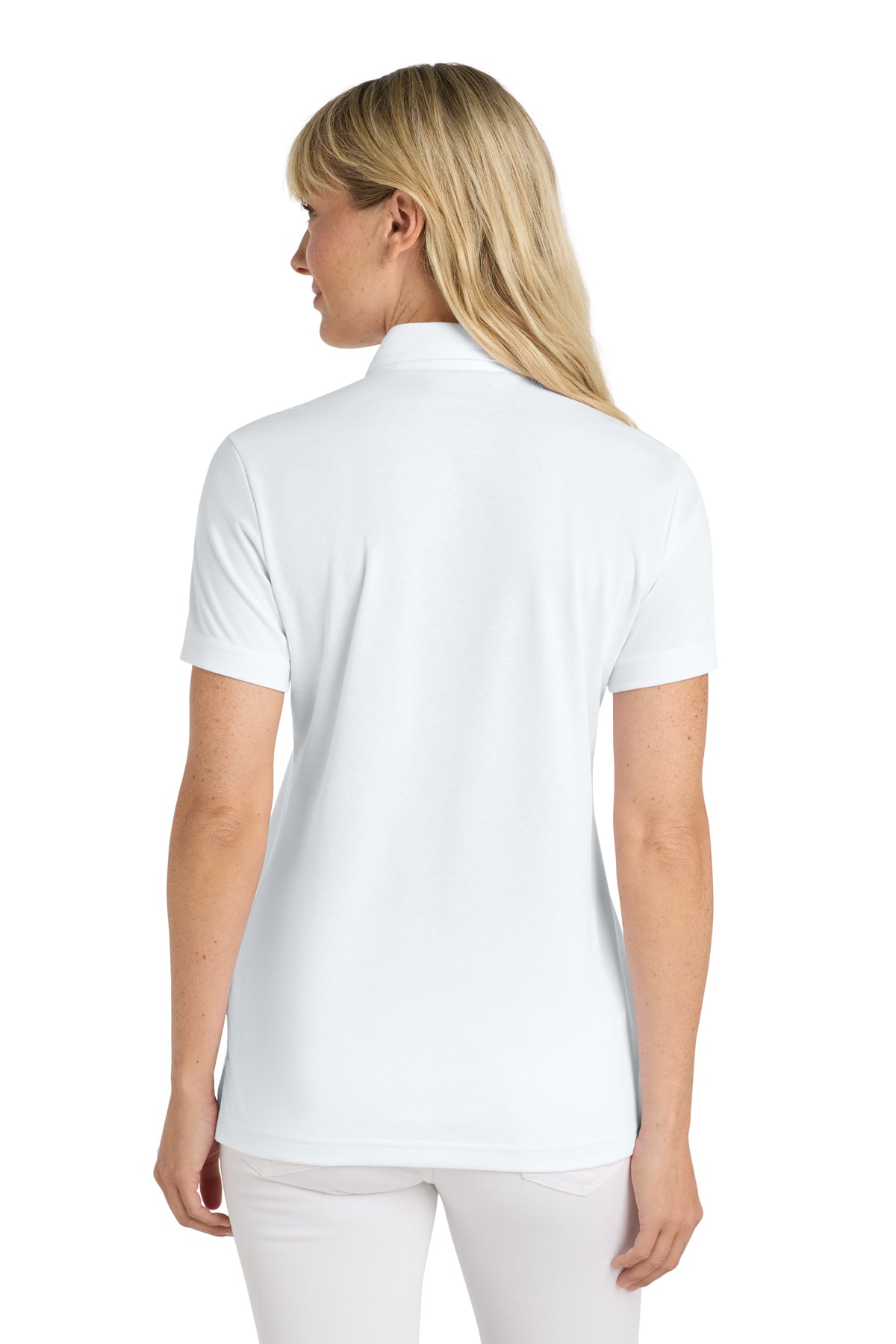 TravisMathew Women's Oceanside Solid Polo in White, back on model