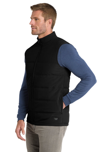 TravisMathew Cold Bay Vest in Black, side on model