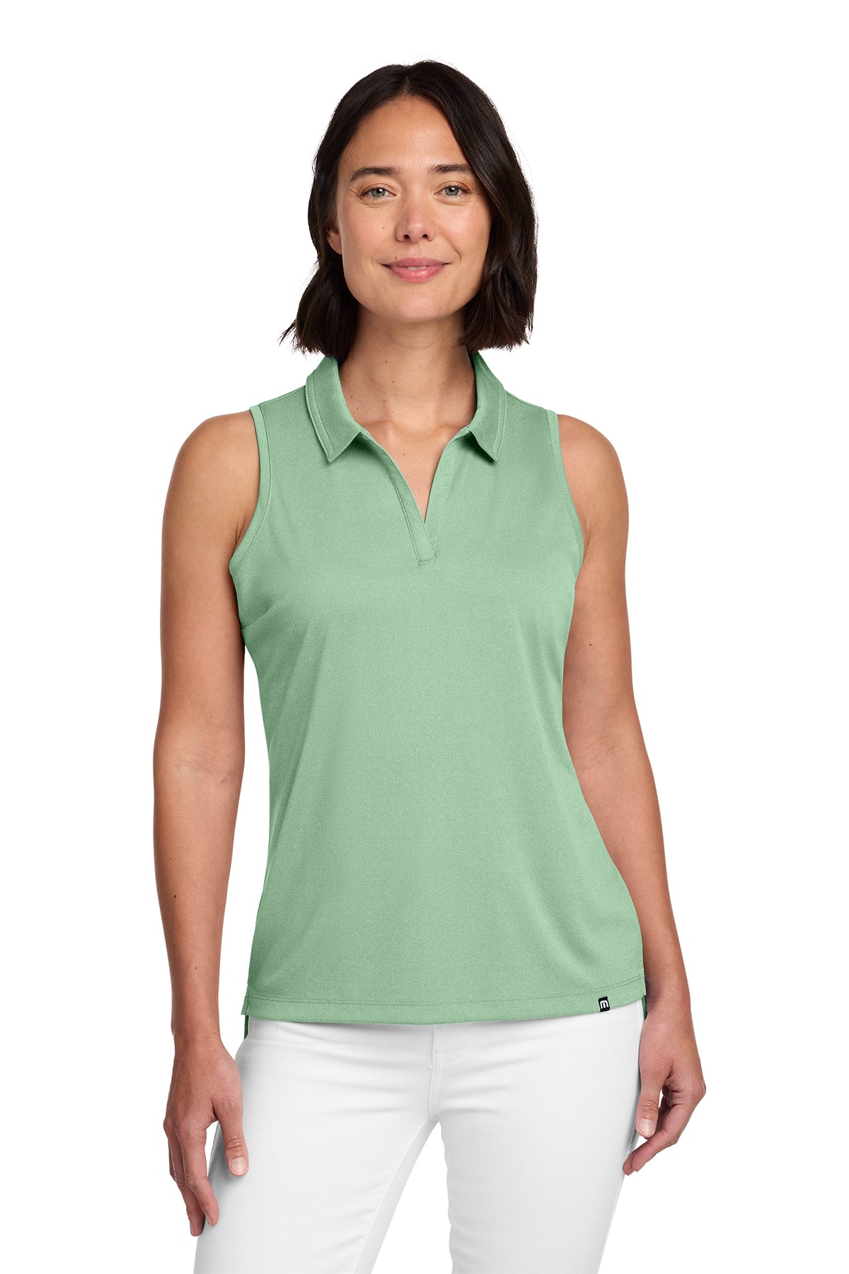 TravisMathew Women's Coto Performance Sleeveless Polo in Beryl Green Heather, front on model