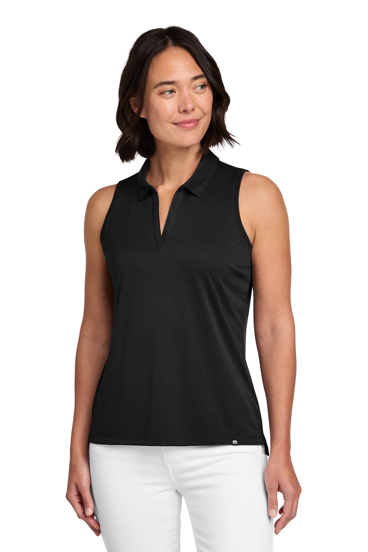 TravisMathew Women's Coto Performance Sleeveless Polo in Black, front on model