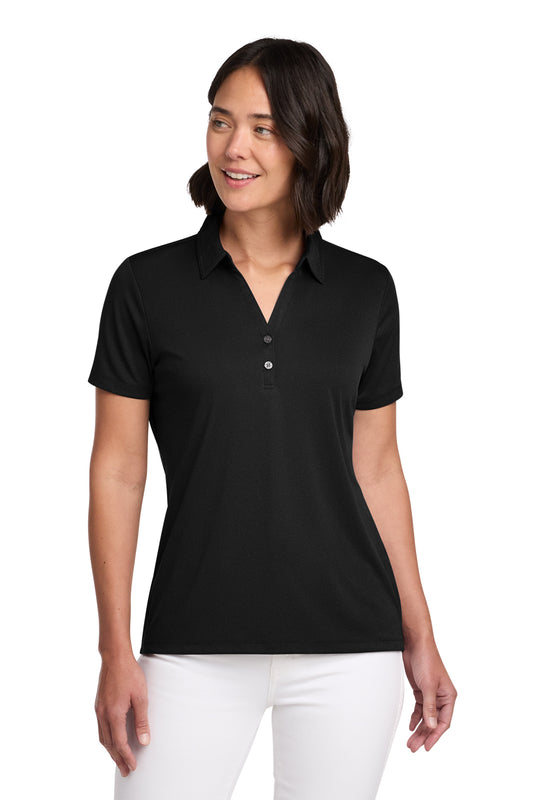 TravisMathew Women's Coto Performance Polo in Black, front on model