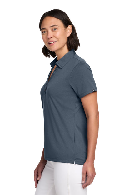 TravisMathew Women's Coto Performance Polo in Vintage Indigo/ Black, side on model