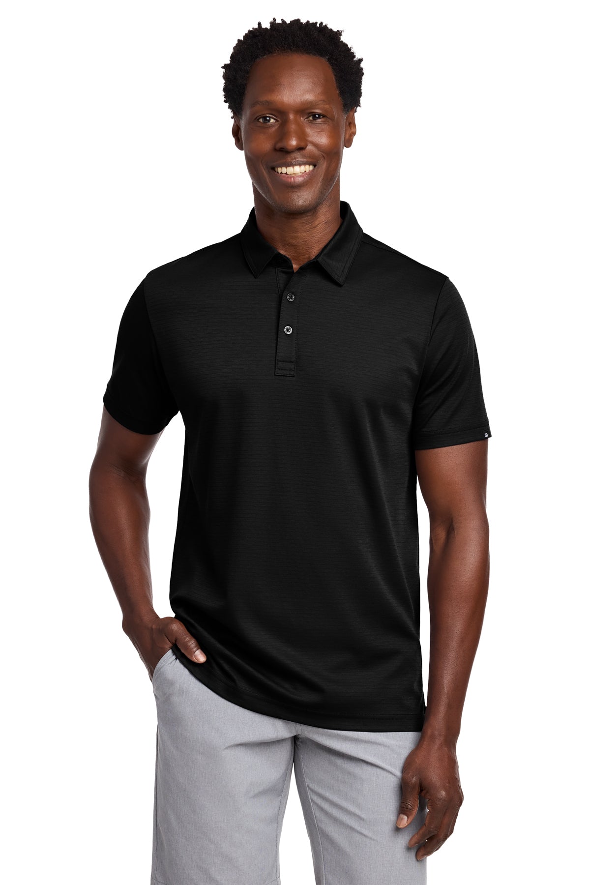 TravisMathew Bayfront Solid Polo in Black, front on model