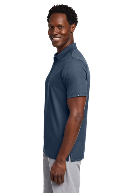 TravisMathew Bayfront Solid Polo in Insignia Blue, side on model