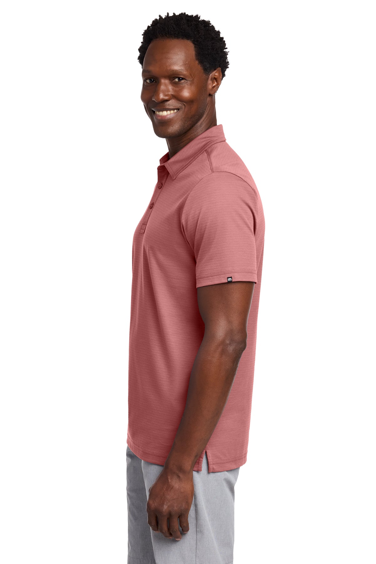 TravisMathew Bayfront Solid Polo in Roan Rouge, side on model