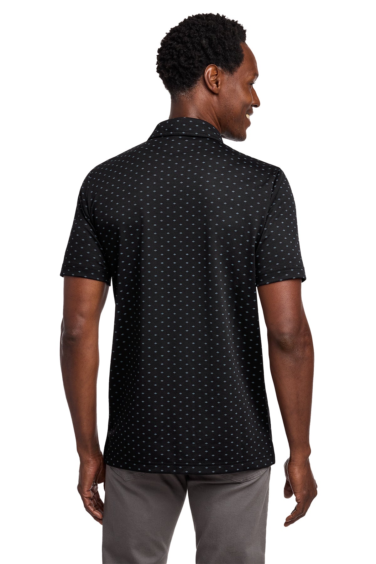TravisMathew Oceanside Geo Polo in Black/ Aegean Blue, back on model