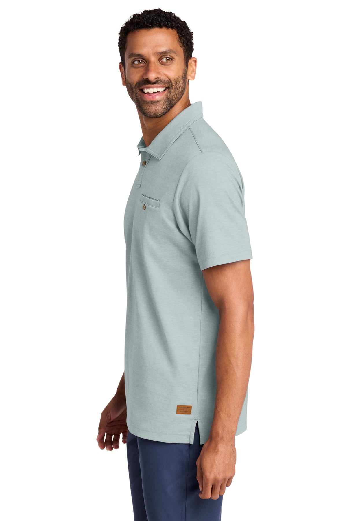 TravisMathew Sunsetters Pocket Polo in Balsam Green Heather, side on model