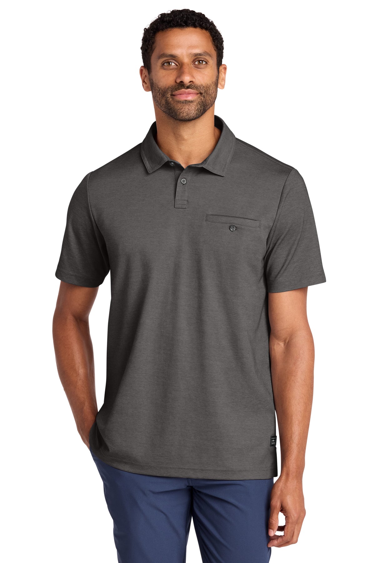 TravisMathew Sunsetters Pocket Polo in Black Heather, front on model