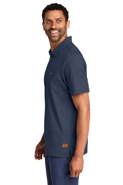 TravisMathew Sunsetters Pocket Polo in Blue Nights, side on model