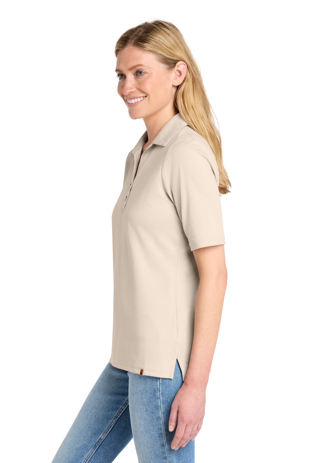 TravisMathew Women's Sunsetters Polo in Natural Heather, side on model
