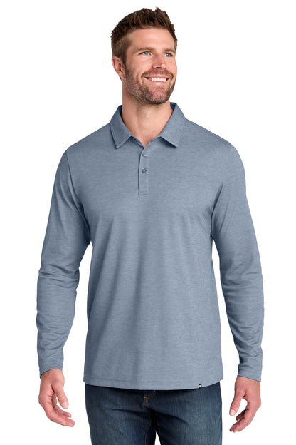 TravisMathew Oceanside Heather Long Sleeve Polo in Blue Nights Heather, front on model