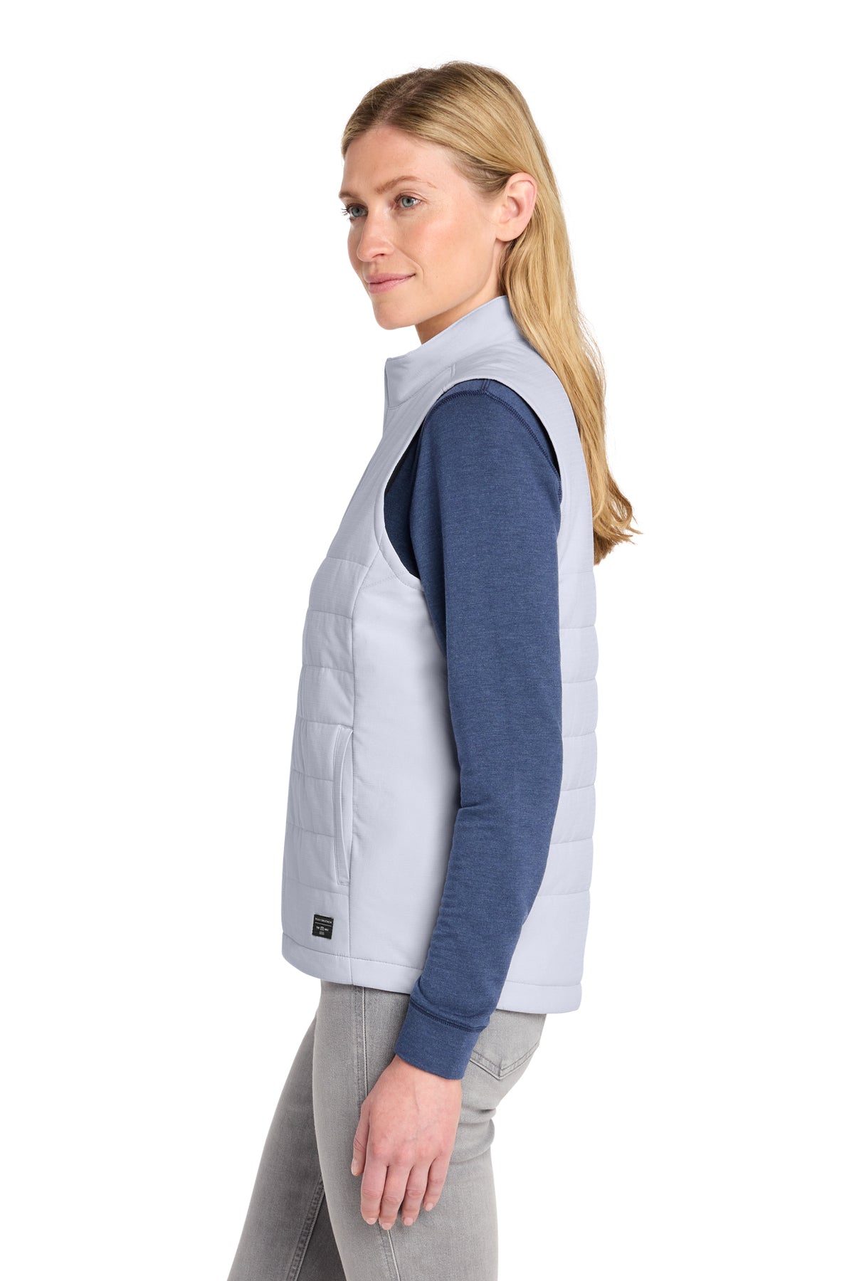 TravisMathew Women's Cold Bay Vest in Microchip Grey, side on model