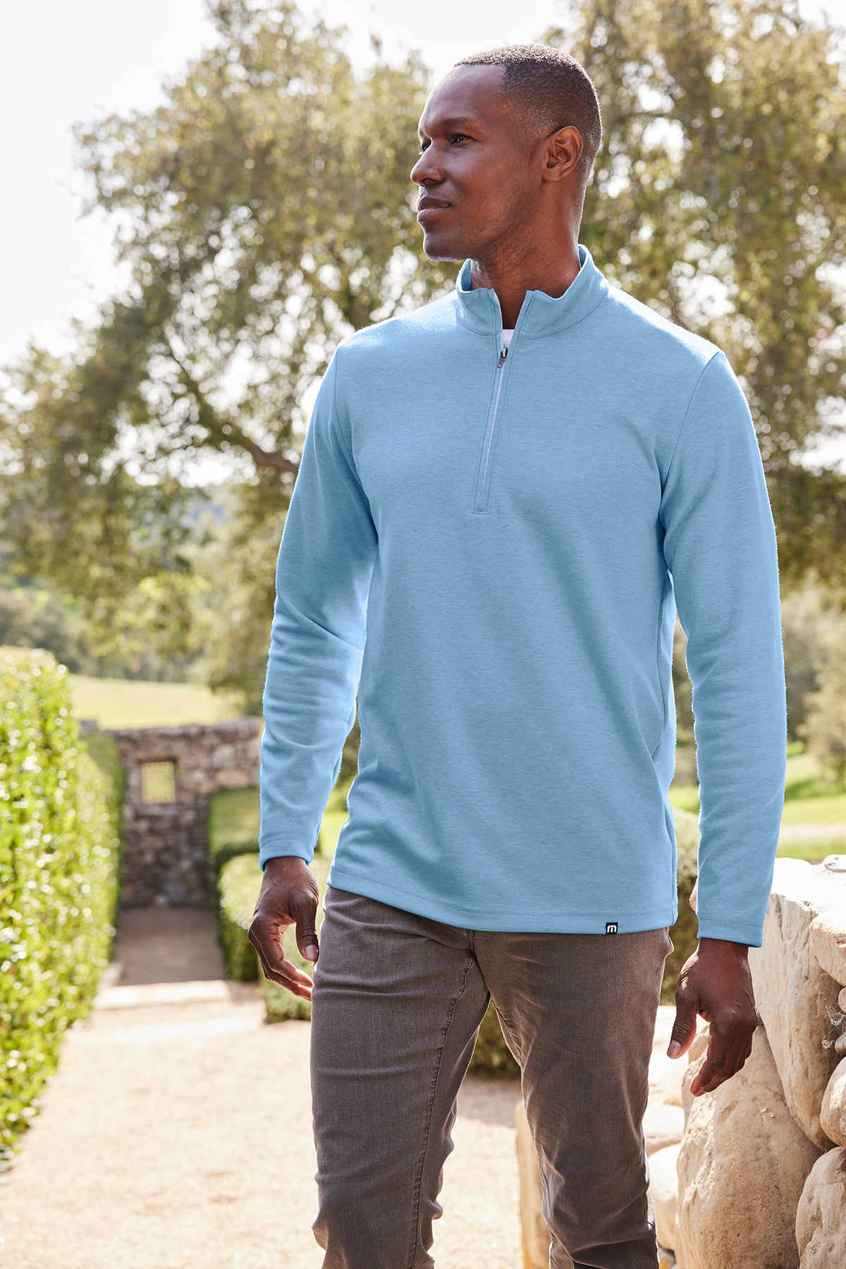 TravisMathew Coveside 1/4-Zip in Light Blue Heather, view on model