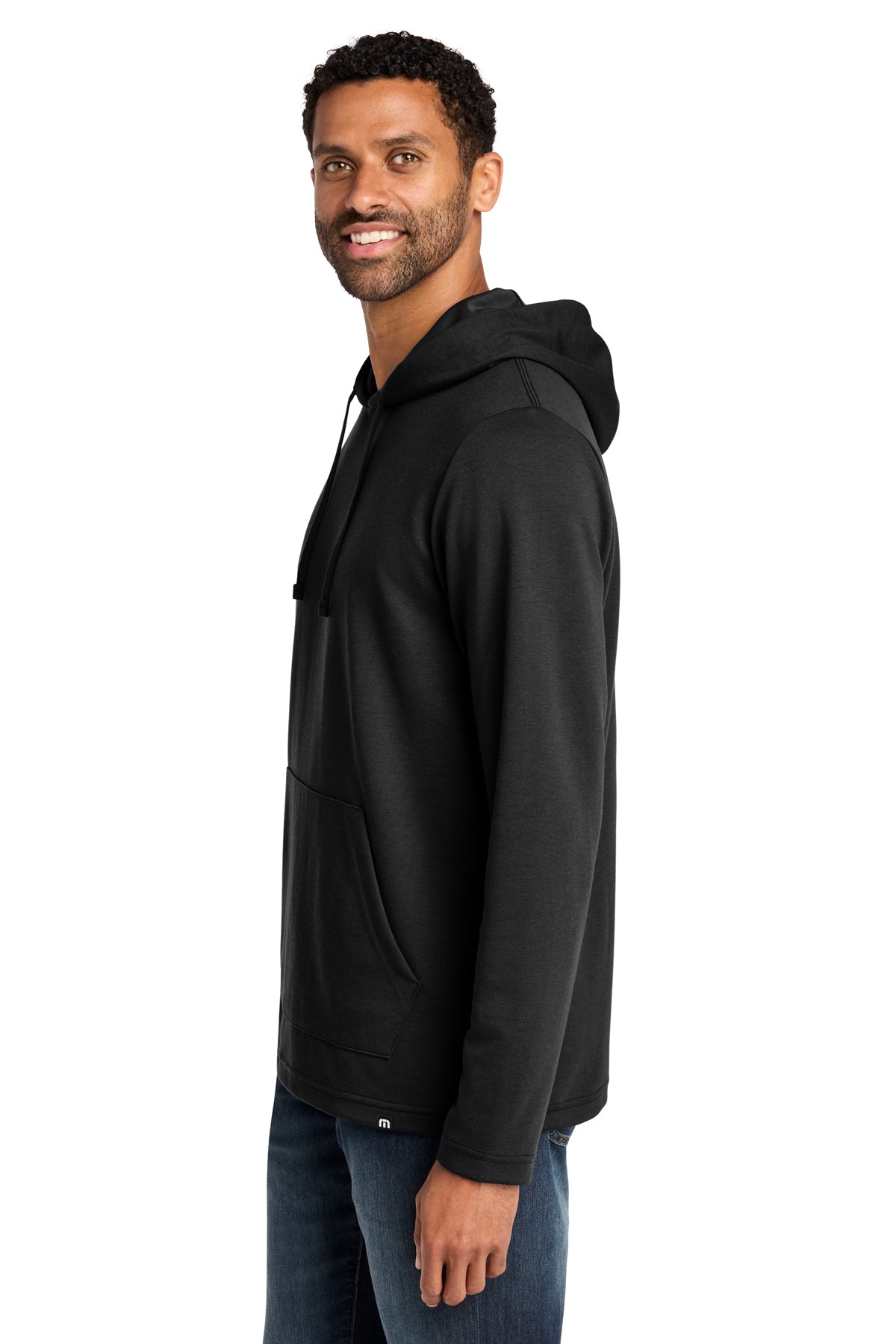 TravisMathew Coveside Hoodie in Black, side on model