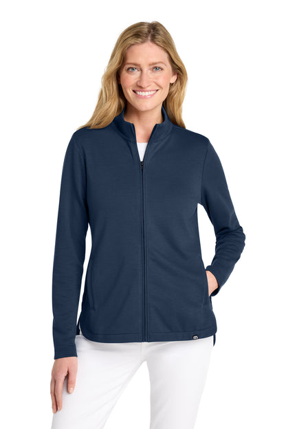 TravisMathew Women's Coveside Full-Zip in Blue Nights, front on model