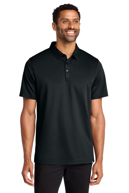 TravisMathew Cabana Solid Polo in Black, front on model