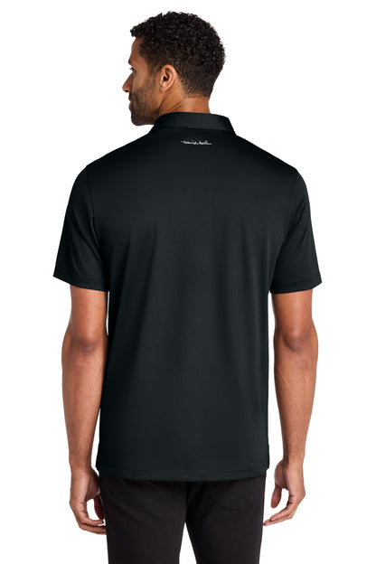 TravisMathew Cabana Solid Polo in Black, back on model