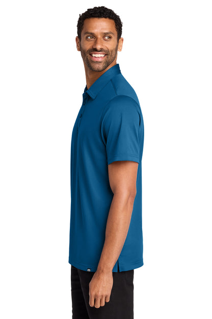 TravisMathew Cabana Solid Polo in Classic Blue, side on model